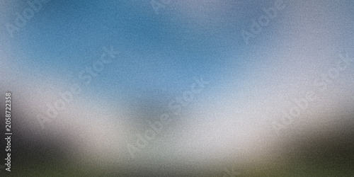 Blurred landscape with blue sky and green field, textured background, 78 characters