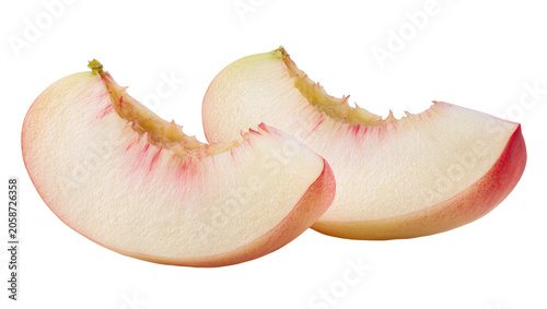Two juicy peach slices with pink blush and white flesh