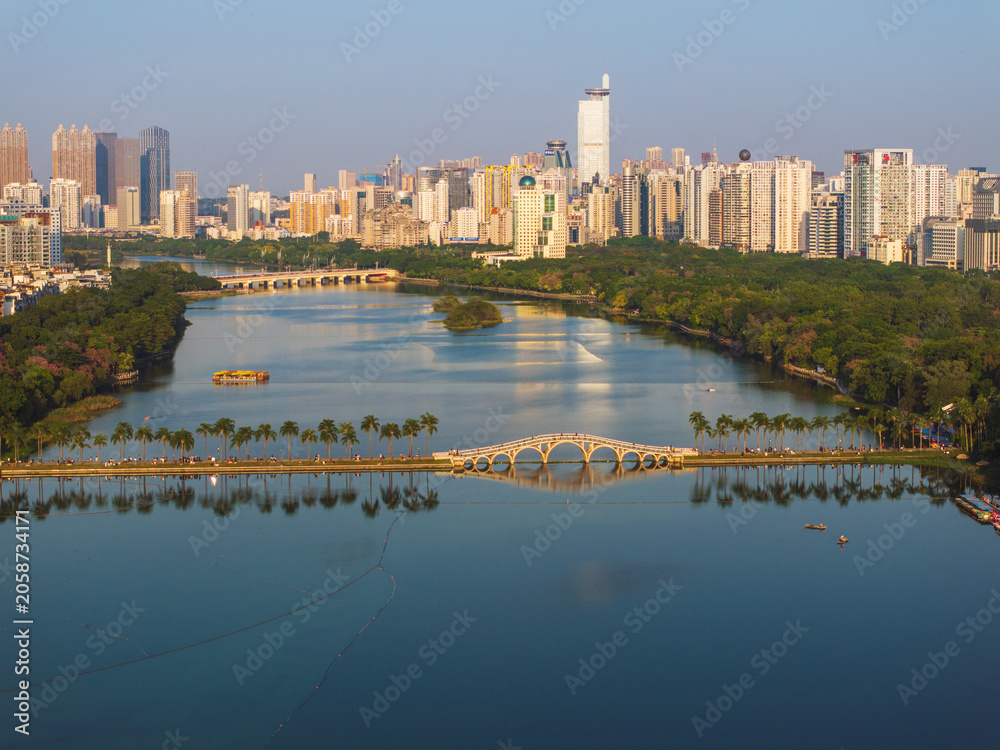 Obraz premium Panoramic View of Nanning, China with Urban Skyline and Serene Lake