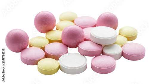Pile of pink yellow, and white round pills