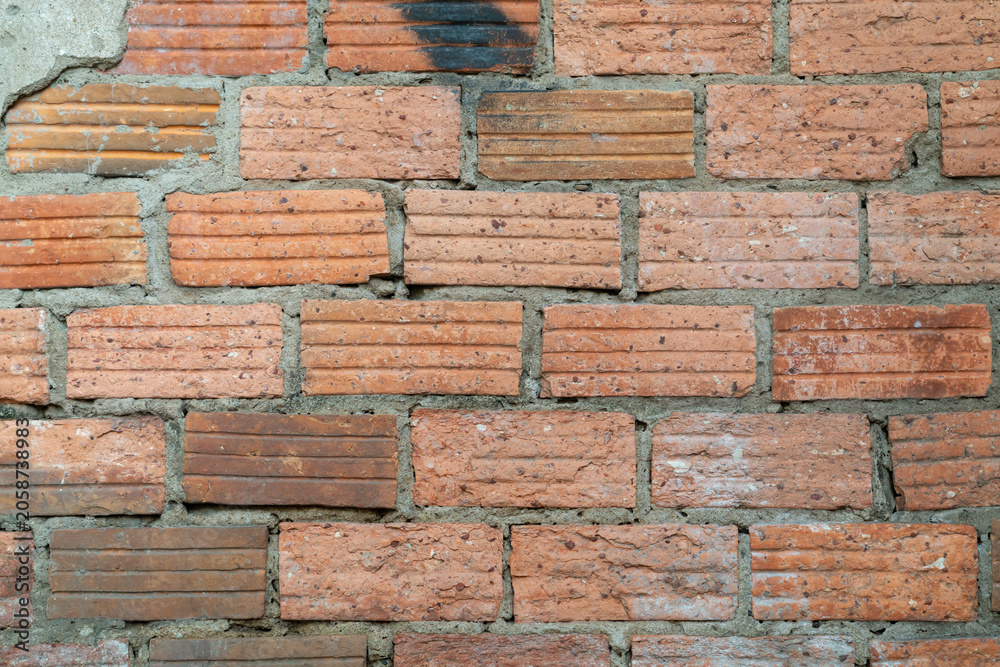 Fototapeta premium Red brick wall texture with rustic masonry pattern background