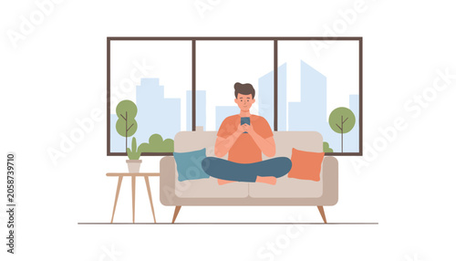 Young man sitting on comfortable couch using smartphone indoors with smartphone technology relaxing
