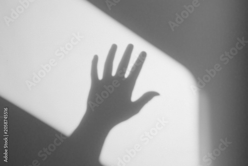 Foto hand shadow on wall background,hand with shadow,hands shadow overlay effects,sil