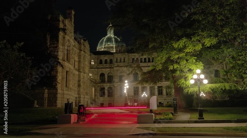 Victoria, BC, Canada – June 14, 2026: Horse carriage passing parliament at night