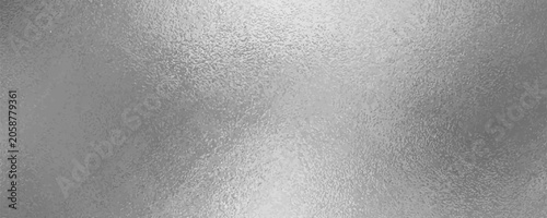 Slika na platnu Shiny silver foil metallic texture - glossy gray steel gleaming surface, frosted glass effect with blur glare reflection, bright polished metal material