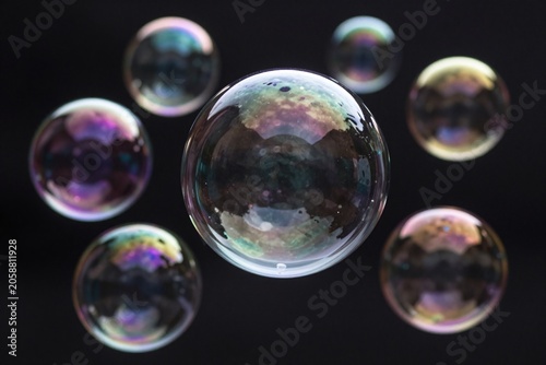 A bunch of soap bubbles floating in the air