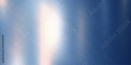 Abstract brushed silver metal texture on a blue light background