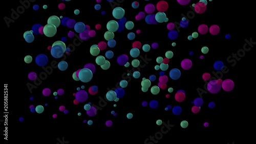 Falling and bouncing spheres. Vibrant multicolored spheres floating on a black background, creating a playful abstract particle composition