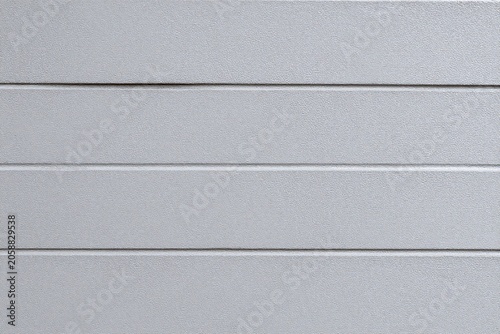 a close up of a metal surface with a pattern on it