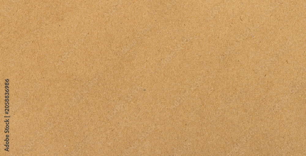 Fototapeta premium Brown recycled paper texture background,Macro,A close-up view of a natural brown recycled paper texture, showing a rough, organic surface with subtle fibers and earthy tones, perfect for eco-friendly 