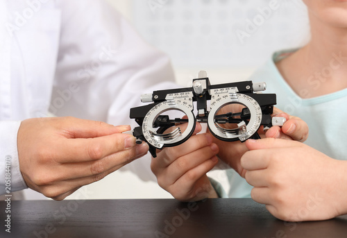 Female ophthalmologist with...