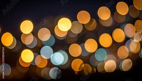 Abstract Bokeh Lights Background with Warm Orange and Cool Blue Hues.