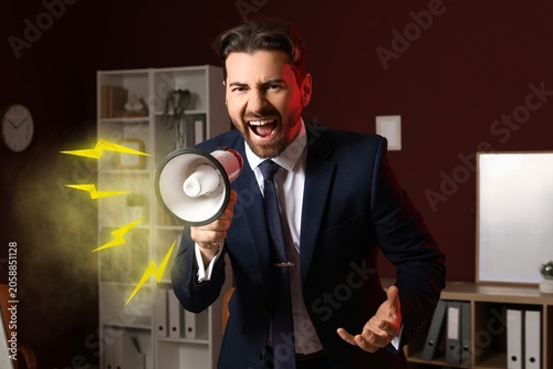 Angry businessman shouting ...