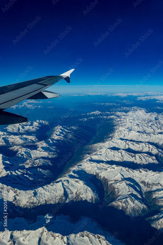 Obraz premium Flug über den Wolken