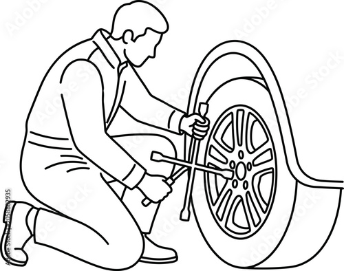 Tableau sur toile Mechanic changing car tire, using lug wrench to tighten bolts on wheel rim