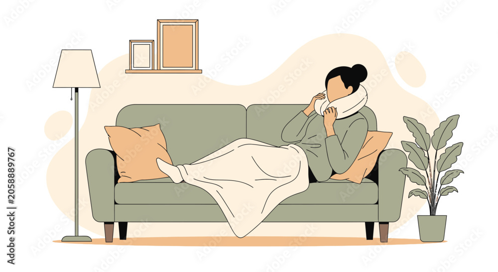 Fototapeta premium Woman sick on couch, wrapped in blanket, drinking hot beverage, feeling unwell