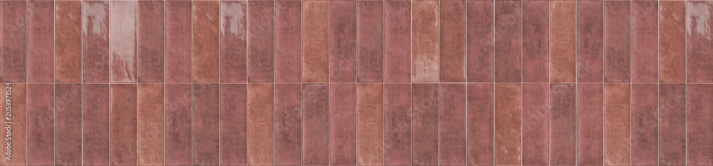Fototapeta premium Architectural panorama of warm caramel and plum vertical rectangular ceramic wall tiles in a seamless block layout.