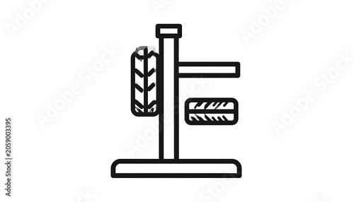 A simple line drawing of a two-tiered stand with abstract objects