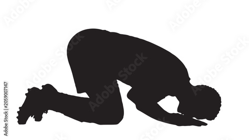 Athlete kneels on the ground in a moment of exhaustion or defeat after a challenging sports match.