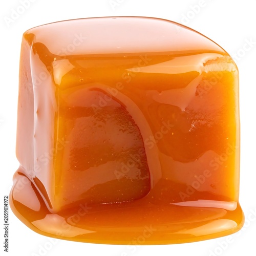 A shiny, golden-brown, square-shaped caramel candy with smooth surface