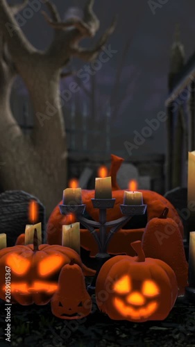 vertical video of pumpkins and candles in a cemetery at night. Halloween background. Camera scroll