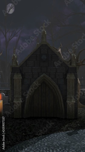 vertical video of pumpkins and candles in a cemetery at night. Halloween background. Camera scroll