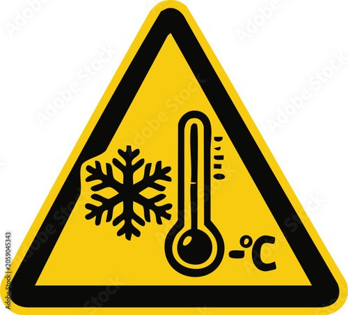 Fotografía Yellow warning triangle with snowflake and thermometer showing sub-zero temperat