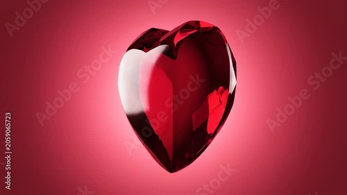 Red heart-shaped gemstone transitions from a faceted heart to a marquise cut and back to a heart shape against a soft red background, showcasing its brilliance and clarity