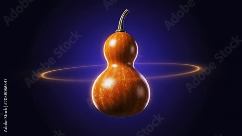 Brown gourd spinning in a circular motion against a dark blue background, illuminated by a glowing ring of light creating a captivating visual effect