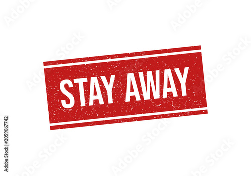 Red rubber stamp with the text stay away on a rectangular label
