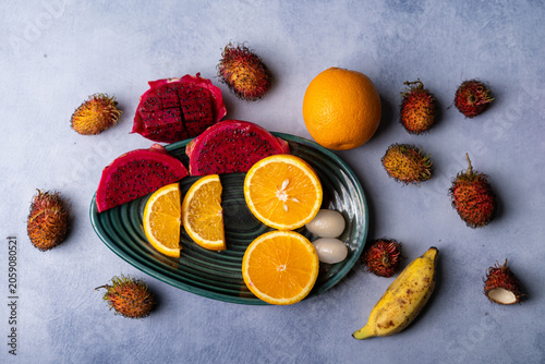 Fresh Dragon Fruit and Orange Slices on Decorative Plate