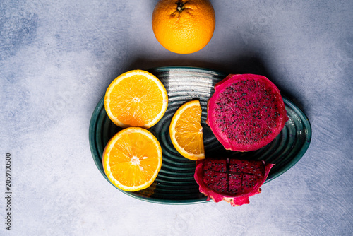 Fresh Dragon Fruit and Orange Slices on Decorative Plate