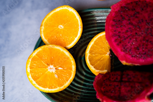 Fresh Dragon Fruit and Orange Slices on Decorative Plate
