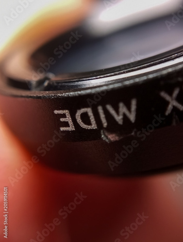 close-up view of the external lens of the smartphone camera clip