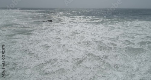 High angle shot of a rough and energetic ocean showing the raw power of nature