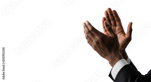 Muscular african american man's hands, mid-clap in a dark suit jacket cuff, high-speed macro shot on a seamless transparent background, copy space. Concept of professional success and appreciation