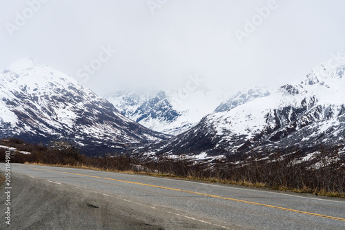 Snow-Capped Peaks Along the Road