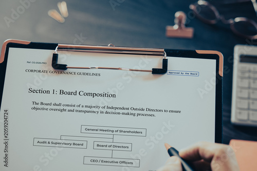 Board Composition: Realistic clipboard-up placed on  with clips, calculator, pen. Contributor-created fictional business document for illustrative purposes.