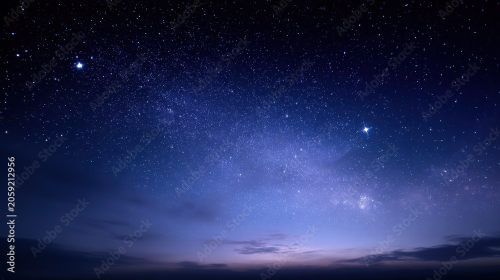 Fototapeta premium Vast Celestial Expanse: Countless Stars Glitter in the Deep Blue Night Sky