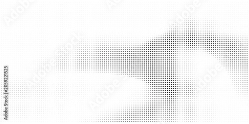 Photos Abstract halftone dot pattern featuring a prominent circular shape on a clean wh