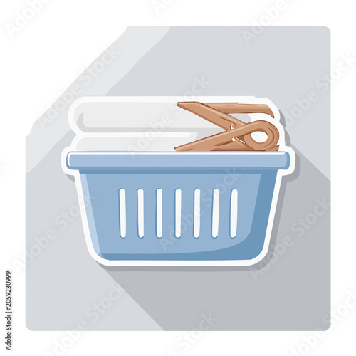 Laundry basket with clothespins icon