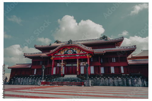 Принти на полотні Red Shuri Castle palace under a teal summer sky in Okinawa