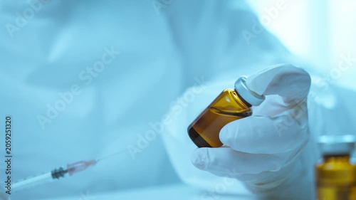 Laboratory Technician Preparing Pharmaceutical Sample for Scientific Analysis. Laboratory workflow, pharmaceutical production, scientific testing, healthcare quality