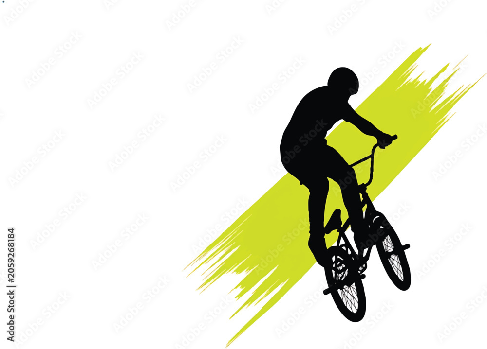 Naklejka premium Silhouette of a cyclist performing a stunt on a bmx bike