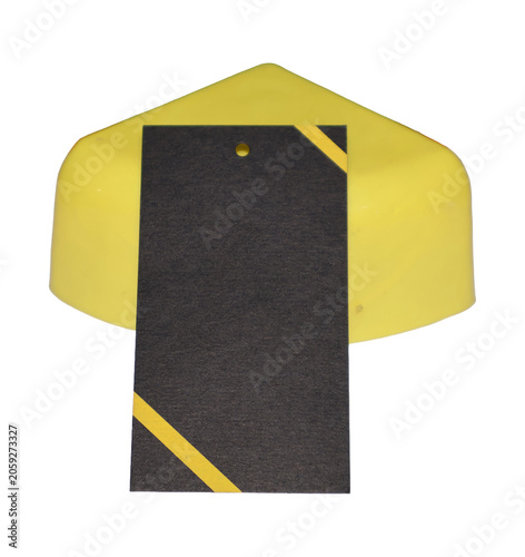 Yellow product tag with diagonal on a bright yellow object