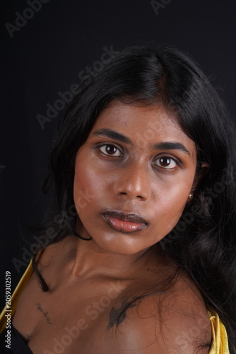 Close-Up Portrait of Dusky-Toned Woman with Natural Beauty