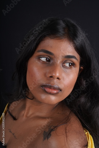 Close-Up Portrait of Dusky-Toned Woman with Natural Beauty