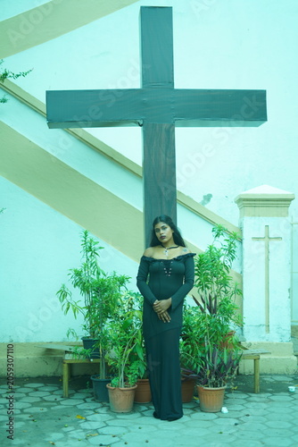 Gothic Model in Church with Cross Background