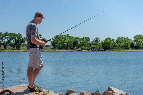 boy fishing on the lake