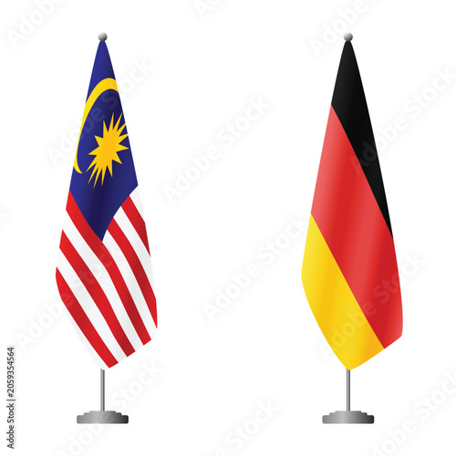Photography Malaysia and Germany flags on flagpoles for official ceremonies and meetings, tr
